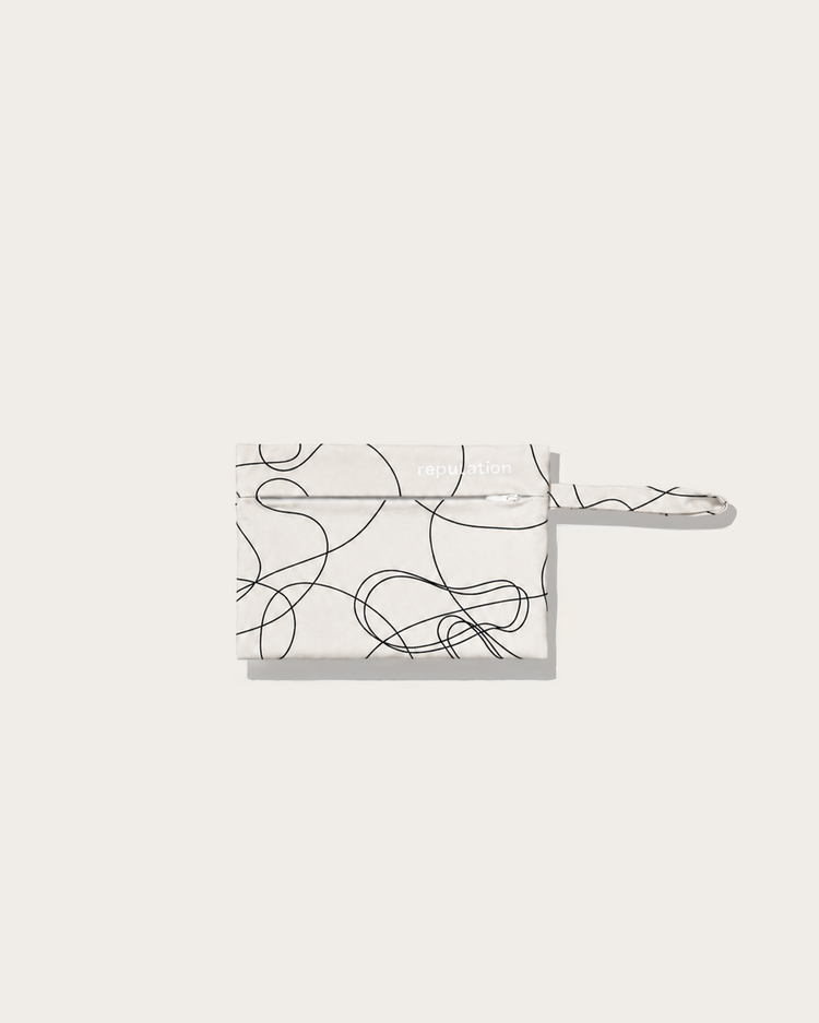 Reputation Drawing print swimwear packaging pouch in white, flat lay